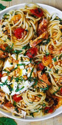 Chicken Spaghetti with Burrata Cheese, Cherry Tomatoes, Lemon Butter Garlic Sauce, and Pine Nuts