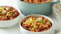 Hearty chili with creamy macaroni and cheese is an unbeatable comfort, and this 100-percent scratch version is the ultimate! Zesty Tex-Mex flavoring, cheddar cheese, green chiles and an extra boost of both chili and garlic powder give this dish deep savory flavor that’s hard to resist. So, put it to the test and see what your family says. If you find it deserves a spot in your permanent dinner rotation, you’ll be glad to know this recipe freezes beautifully!