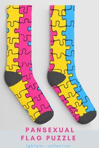 Society6's soft and stretchy socks with the pan pride flag printed on them - lgbt collection, lgbtqia+ puzzle pieces. They are made from a comfy cotton/recycled-poly blend for enhanced stretch and feel. Available in one, two or three pair sets. Seamless, crew style Reinforced toe and heel in black 58% recycled polyester, 22% nylon, 15% cotton, 5% elastane Machine washable, no bleach Tumble dry low, no iron Socks fit: Men's US size 6-13, Women's US size 7-14, UK size 5.5-13.5, EU size 37-47