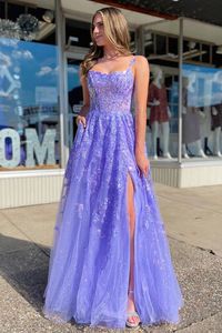 Look stunning in this romantic Lavender Tulle Sequin Scoop Neck A-Line Long Dress with Slit. This glamorous gown showcases a beautiful scoop neckline, open back, delicate lace appliques, and a dramatic side slit. Perfect for prom, special occasions, or any night you want to shine!#prom#promdresses#promgown#formaldress#formaloutfit#seniorpromdress#promgown#blacktieeventdresses#graduationdress