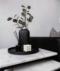 One of the ways we layer objects with simplicity but making a statement to our living room