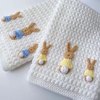 bean_crochet on Instagram: "Two down…another two to finish 🐰💙🐰💛🐰💙🐰 This is one of my favourite patterns and is also a super popular one with my family Pattern is the Bunny Parade Blanket by @kerryjaynedesigns Blanket yarn is @stylecraftyarns Bambino #bunnyparadeblanket #kerryjaynedesigns #kerryjaynedesignspattern #babyblanket #bobtailblanket #crochetbabyblanket #bunnyblanket #babycrochet #crochetforbaby #crochetblanket #handmadewithlove #handmade #craft #crafters #crochet #crocheters #cr