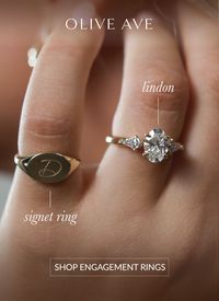 14k yellow gold | 1.20ct lab diamond oval cut center stone with kite shape accent stones paired with customized signet ring