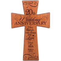 Honor the happy couple with a personalized 20th wedding anniversary cherry wall cross. A treasured and lasting personal keepsake for a wedding or anniversary. 20th Anniversary cross can be hung on the wall. These special keepsake crosses will always be a wonderful reminder of the love that you have for one another. Honor the happy couple with a personalized 20th wedding anniversary cherry wood decorative wall cross. The verse reads Two hearts, two lives, one love. 20th-anniversary cross. Made in