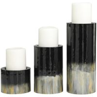 DecMode 3 Candle Black Metal Colorblock Candle Holder with Gold and Silver Streaks, Set of 3 is a unique addition to your stylish home. A warm and welcoming way to elevate the look of your tablescape and complement your existing decor. Give your space a radiant illumination with these beautifully crafted candle holders. Place this black set of 3 candle stands on a console, mantle, or dining room table to create moody lighting and elegance in the home. Designed with felt or rubber stoppers at the base that prevent scratching furniture and table tops, as well as sliding around. Can hold 3 pillar candles, not included. This item ships in 1 carton. Metal candle holder makes a great gift for any occasion. Suitable for indoor use only. This item ships fully assembled in one piece. Made in India.