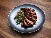 Get Seared Duck with Pomegranate Molasses and Israeli Couscous Recipe from Food Network