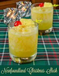 Newfoundland Christmas Slush. A frosty blend of pineapple and citrus juices frozen together with amber rum to create the base for a delicious Holiday cocktail. #christmas #Party #drinks #cocktails #Holidayparty #christmascocktails