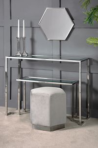 A handsome, sculptural console table inspired by classical Greek architecture. The distinctive geometric shape incorporates an integral shelf for display and additional storage. Tubular steel construction with mirror polished chrome finish. Toughened glass surfaces. #table #consoletable #console #furniture #home #homedecor #livingroom AFFILIATES LINK