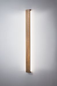 Minimalistic linear wall lamp SLIMPEACE comes in two lengths size (50 cm and 100 cm) and two finish types (smooth and burls/knags). This simple and minimalist lamp gives ambient light to your wall. Its universal design allows it to be combined with many styles. The lamp can be mounted vertically and horizontally. A very high-class LED strip powered by a 24V power supply was used. The wooden housing is held on the metal frame by magnets. Finished with the utmost care. 230V mains connection (short