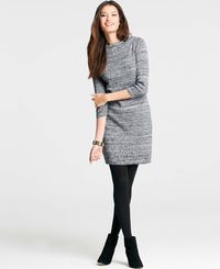 Inspired by posh 60's European ski resort wear, our luxe merino wool blend sweater dress is the epitome of chalet chic this season. Ribbed mock neck. 3/4 sleeves. Ribbed cuffs and hem. 19 3/4" from natural waist.