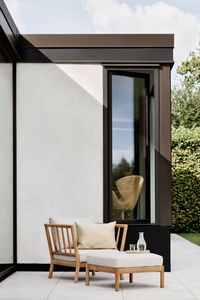 Step into a world of timeless elegance with Fritz Hansen's Tradition outdoor collection. Crafted by designer Povl B. Eskildsen, this series of garden furniture is an ode to tradition and beauty. With modular outdoor seating and teak tables, it's perfect for relaxing under the golden sunset or creating unforgettable moments under the twinkling evening sky.