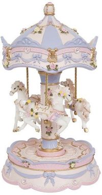 Musical Revolving Carousel Wind-up and watch this stunning 4-piece horse carousel serenade you with the softest of melodies as it revolves round and round to the melody CASTLE IN THE SKY. Each inch is exquisitely decorated to make it a stand-out keepsake item to adorn any room. Our musical carousel