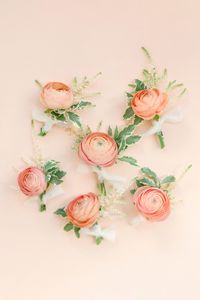 Floral Inspiration: Peach Ranunculus The color scheme for the wedding was inspired by the bride's favorite flower: peach ranunculus.