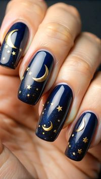 Get ready for a stunning celestial Halloween nail look! These deep navy nails feature a pearlescent sheen, adorned with delicate gold foil crescent moons and stars. The ombré tips mimic a serene night sky, perfect for adding a refined cosmic vibe to your Halloween style. Whether you're dressing up or keeping it simple, this nail art brings an elegant twist to spooky season nails.      #CelestialNails #HalloweenNailArt #NavyNails #MoonAndStarsNails #GoldFoilNails #OmbréNails #SpookySeasonNails #RefinedHalloweenNails #NightSkyNails