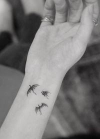 Dainty dragons tattoo