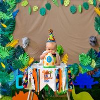 "*Please check turn around times. All items are made to order* Listing is for high chair banner only. Other decor in photo is not included. This high chair banner is super cute for a dinosaur themed party! Made with fabric, ric rac, and a \"one\" dinosaur banner. Fits standard high chair trays. All of G&W's high chair banners/tutus come with hook and loop fasteners attached so you can easily attach it to your high chair. Can be made in any color to fit with your child's party theme! When ord