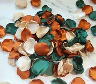 Your set of Fall Boho Chic Rose petals will include Terracotta, Emerald Green, Beige and Ivory satin flower petals. You can customize your set by adding Gold petals. This stunning combo of flower petals are perfect for flower girl tossing, scattered on reception tables, wedding confetti or used as Aisle Decor. We offer our gorgeous petals in several styles and color combinations that you can Customize by adding additional colors or omitting a color/s. This allows you to create a Perfect set that