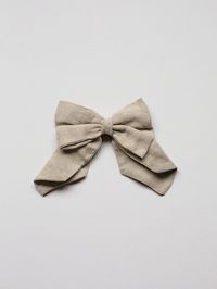 Our classic organic linen hair bow instantly adds an extra special touch of joy to any outfit. Our bow is made with an antique brass barrette and is simple to clip into short or long hair. It’s an accessory you’ll be reaching for daily and it pairs so sweetly with our Linen Jumpsuit. GOTS certified and free from harmfu