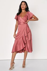 It's easy to look gorgeous when you've got a secret weapon like the Lulus Serene Sight Rusty Rose Midi Wrap Dress! Satin-like, crinkle-woven fabric (with a subtle sheen throughout) shapes this elegant dress that has short flutter sleeves (with elastic at the shoulders) atop a surplice bodice with light gathering at the front. Overlapping skirt features tiered ruffles and falls to a slight high-low midi hem. Fit: This garment fits true to size. Length: Knee to mid-calf length. Size medium measure