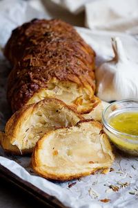 Easy Garlic Cheese Pull Apart Bread is a great appetizer or side and can be made in minutes. Adding lots of garlic and cheese make this bread so delicious. There's no way one bite would be enough!