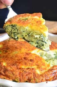 Spinach Artichoke Crustless Quiche. This crustless quiche is made with fresh spinach, artichoke hearts and lots of cheese. It's a healthier version but just as smooth and creamy. #quiche #eggs #breakfast #healthy #keto #spinach #crustless