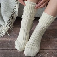 Experience the exceptional comfort and warmth of our alpaca wool socks. Made from a unique blend of materials, these socks provide excellent thermal regulation, keeping your feet warm in cold weather and cool in the heat. The natural properties of alpaca wool resist odors and dirt, creating an unfriendly environment for bacteria, making them perfect for allergy sufferers. With 50% alpaca wool, 36.5% polyamide, 13% wool, and 0.5% elastane, these socks are not only soft and fluffy but also durable