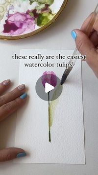 Watercolor Arist | Bree Copley on Instagram: "I hope you try this out!  These really are the easiest watercolor tulips! Below is a list of supplies I used in this video … Comment “Tulip”  if you would like the links.   But first Here are some helpful tips for creating these.   -Make sure the center petal is COMPLETELY DRY before you add the side petals.    -And remember it’s totally ok if your petal doesn’t turn out right in one stroke of a brush.  Just use the tip of your brush and a little more paint to get it to the shape you want.  There is nothing wrong with adding to these steps. These simple steps are a a base to start out you can make your tulips to your liking.   -you can also use these steps to make buds for many different flowers so play around with it using it it different ways