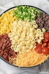 Bacon, ground beef, cheese, and hot sauce make this Cowboy Pasta Salad a definite crowd pleaser! Perfect for summer get togethers.