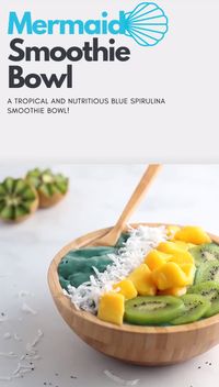 This blue spirulina smoothie bowl recipe is a super healthy breakfast! Made with tropical fruits, frozen bananas and creamy coconut milk. The perfect way to cool off on a hot summer morning! #veganrecipe #smoothiebowl #spirulina #smoothie