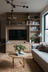 Transform your small living room with these clever designs! From wall-mounted TVs to built-in shelving and multipurpose furniture, find inspiration for your Living Room Setup and Home Décor. Perfect for modern styles and tiny spaces, these ideas will help you maximize your Living Room Layout and create a cozy, spacious feel.  #LivingRoomDesigns #LivingRoomIdeas #HomeDecor #LivingRoomTV #SmallLivingRoomIdeasWithTV #LivingRoomInspiration #SmallLivingRoomDecor #SmallModernLivingRoom #ApartmentLivingRoomDesign #TinyLivingRooms