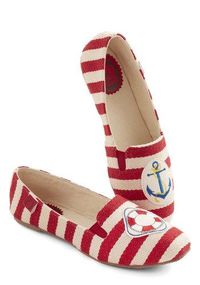 Mariner Character Flat Dazzle fellow seafarers by flaunting these nautical loafers by Miss L Fire! Inspired by Hollywood’s golden era of glamour, this London brand blends classic silhouettes with contemporary details to create fresh and timelessly flattering footwear. With woven fabric uppers in red and cream, these striped slip-ons flaunt unique maritime appliques on each toe.