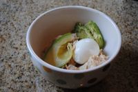 One Hard-Boiled Egg + 1/2 Avocado + Light Tuna. Mashed together like tuna salad. Healthy and FILLING lunch!  Would be good with chicken also.