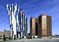 'The Ascent at Roebling's Bridge' is a residential building in Covington, Kentucky, United States, in the greater Cincinnati area. Designed by Daniel Libeskind, the building sits along the Ohio River across from the Roebling Suspension Bridge. It was commissioned in 2004 and was completed in March 2008 at a cost of approximately $50 million. -- Wikipedia 