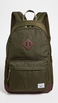 Find HERSCHEL SUPPLY CO. Herschel Heritage Backpack on Editorialist. The Herschel Supply Co. Heritage Backpack is crafted from ballistic weave with a signature logo patch at the front. It features a padded laptop sleeve, leather base and accents, side patch pockets, and a front zip pocket with a mesh pouch and interior key clip. The backpack has adjustable shoulder straps, a textile lining and a zip closure. It measures 17.75 inches in height, 12.25 inches in length, and 5 inches in depth.