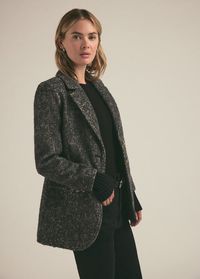 When your runway is a city sidewalk, grab this slim fit, wool-blend blazer. There are faux horn buttons, front flap pockets, delicate stitching details along with an elegant tweed texture. But our favorite part is the cotton-cashmere ribbed cuffs for when walking to work is your very own fashion show. 41% Wool, 33% Polyester, 23% Acrylic, 3% Others Megan is 5'10" wearing size small.