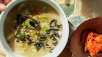 Delicious Vegan Rice Cake Soup (Tteokguk) with Dumplings. 1