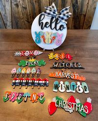 Shiplap Hello Seasonal sign Size-11in diameter  Round Hello Sign, 1 insert of your choice, stand and Ribbon included for just the base and 1 insert option WHOLE SET INCLUDES ALL 11 INSERTS, BASE AND STAND Sign painted like pictures, unless otherwise noted! This sign is made to order and may differ slightly from the photos. Each sign is unique and features imperfections, such as knots. These imperfections give character to the sign and no 2 signs are alike.  Your product will ship within 1 to 2 w