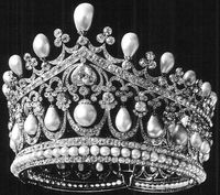 The largest tiara worn by Tsarina Alexandra Feodorovna, the Diadem of Ancient Pearls, dating from early 19th century. Featuring a base of button pearls and diamonds, plus some twenty baroque pearls suspended within diamond hoops, the central one with a heart-shaped diamond, and topped by more baroque pearls with trefoil diamond clusters