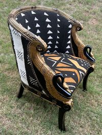 This French Empire Chair has SOLD!....if you are interested in a similar chair, contact me.  One of A Kind French Empire Reupholstered Accent Chair.   The 3 Authentic Vintage MudCloth- Bogolan Cloth gives this chair its unique character Geometric Tribal Pattern. Black Wood  Frame with Gold Accent and Swan Carved Armrest.