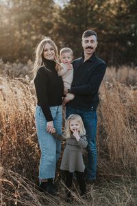 Timeless Family Photo of 4 | Atlanta Family Photographer. This family of 4 was so much fun to document! Their kiddos have the sweetest personalities! Get inspired with candid family photography in Georgia, family of 4 outfit ideas, and family of 4 pose ideas in a field. Want to be in the know of my exclusive family session times? Join my email list today or visit me at rachelboydphoto.com