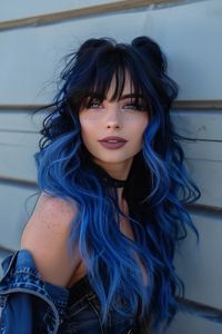 Are you ready to make a bold statement with your hair? Look no further than the mesmerizing world of blue highlights! This daring hair color trend has taken the beauty scene by storm, offering a