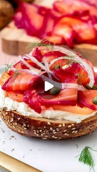 @thefeedfeed on Instagram: "Beet Cured Gravlax Tutorial from @andrealoretdemola 💕

An overnight cure in a zesty, salty-sweet brine provides an irresistible flavor, while the rich color provides the most stunning pink hue. Serve on a bagel with cream cheese for good measure 🥯 Get the recipe below and keep tagging #feedfeed for a chance to be featured.

INGREDIENTS:
2 teaspoons black pepper
2 teaspoons cumin seeds
2 teaspoons fennel seeds
1 1/4 cups kosher salt
1/2 cup sugar
2 teaspoons finely grated lemon zest
2 teaspoons finely grated orange zest
1 3-pound skin-on salmon fillet, pin bones removed
2 medium beets, peeled and coarsley grated

RECIPE:
1. Toast peppercorns, cumin seeds and fennel seeds in a dry small skillet over medium heat until very fragrant, about 5 minutes. Let cool, the