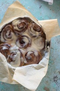 Coffee Cardamom Morning Buns with with Crème Fraîche Icing. Warm, gooey rolls of enriched yeasted dough filled with fragrant coffee-cardamon-brown-sugar-butter, topped with tangy vanilla crème fraîche icing. They go from scooping flour into a mixing bowl to warm from the oven in 90 minutes. So good.