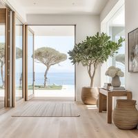 An organic California entryway with white oak and a large entryway tree.