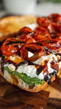 Yarin Shachagi on Instagram: "Burrata Caprese Sandwich with Cherry Tomato Confit

This caprese sandwich is packed with flavors and easily one of my favorites. It has a creamy texture for the Burrata, fresh aroma from the homemade pesto, peppery flavor from the arugula and a sweet garlicky taste from the tomato confit and balsamic glaze. All this goodness is squeezed in between two fresh and lightly crunchy baguette halves.

Ingredients:

For the Fresh Pesto:
- 2 cups fresh basil leaves
- 1-2 tbsp toasted pine nuts
- 1/2 cup grated Parmesan cheese
- 2-3 garlic cloves
- 1/4 tsp salt
- 3 tbsp olive oil
- 2 tbsp water (optional, for a lighter texture)

For the Cherry Tomato Confit:
- 3 garlic cloves, peeled
- 3 tbsp olive oil
- 1/2 cup cherry tomatoes
- 1 sprig of rosemary (optional)
- 1 tsp k