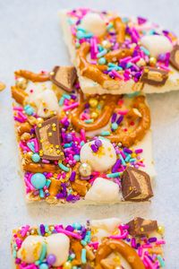 Loaded Unicorn Bark – Forget about that drink you missed out on and make this EASY white chocolate bark in 5 minutes!! It’s LOADED with pretzels, peanut butter cups, marshmallows, and sprinkles! Guaranteed to put a SMILE on everyone’s face!! Did you try the unicorn frappuccino? My daughter was dying to try it and while …