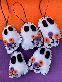 Spooktacular felt ghost ornaments, with small embroidery detailing. Perfect for the person that loves Halloween and all things cute and spooky! All ghosts are handmade and will vary slightly in shape. Every ghost is between 2-2.5 inches tall.