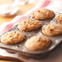 Apple Crunch Muffins Recipe -These apple-filled muffins taste like little coffee cakes. I sometimes drizzle hot caramel over the muffins and serve them as dessert. —Brenda Betz, Oakland, Maryland