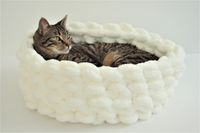 Spoil your furry friend with this softest super chunky chenille yarn bed You can make it yourself within 20-30 minutes! DIY Kit includes: - 2 skein of Chunky chenille yarn of color of your choice for a bed of 15-16 in in diameter - Link to a video tutorial showing how to Hand crochet it Your kitty will spend long enjoyable hours in her bed! Color shown in first picture: Yellow Size in picture: Medium, 16 inches in diameter Wash on gentle cycle in cold water, lay flat to dry This beautiful super