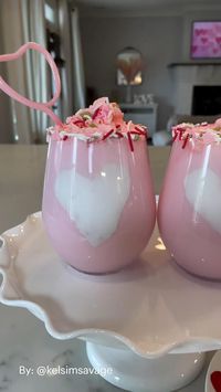 Content Creator: @kelsimsavage Used marshmallow fluff to make a heart on the inside of the glass and filled it with strawberry milk. These were a hit with the kids!!❤️⁣Topping: Pink whipped Cream